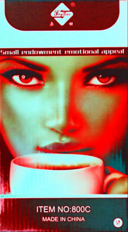 Girl looking over coffee cup on coffee maker box